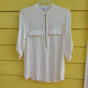 Calvin klein. Women  top  3/4 sleeve  SX M.